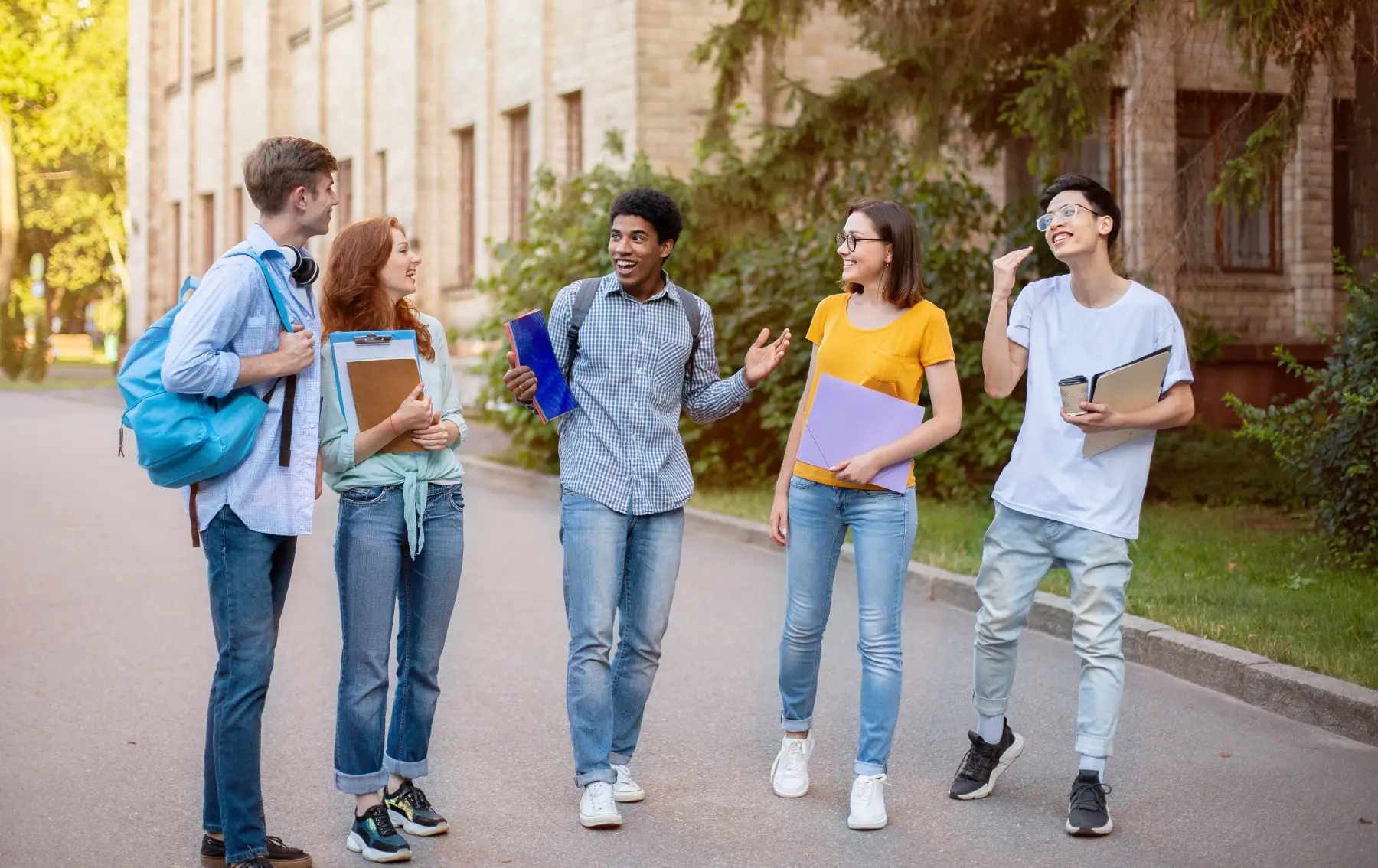 Students gathering in a shared community space at University Edge apartments